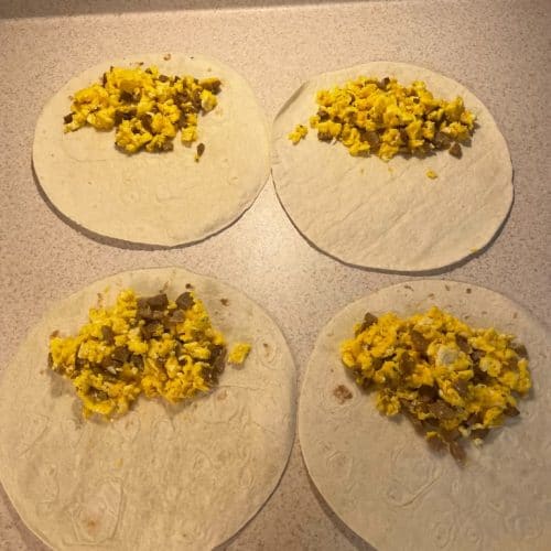 breakfast burritos being assembled